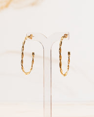 Argola Entrelaçada Hipoalergênica Banho Ouro 18K