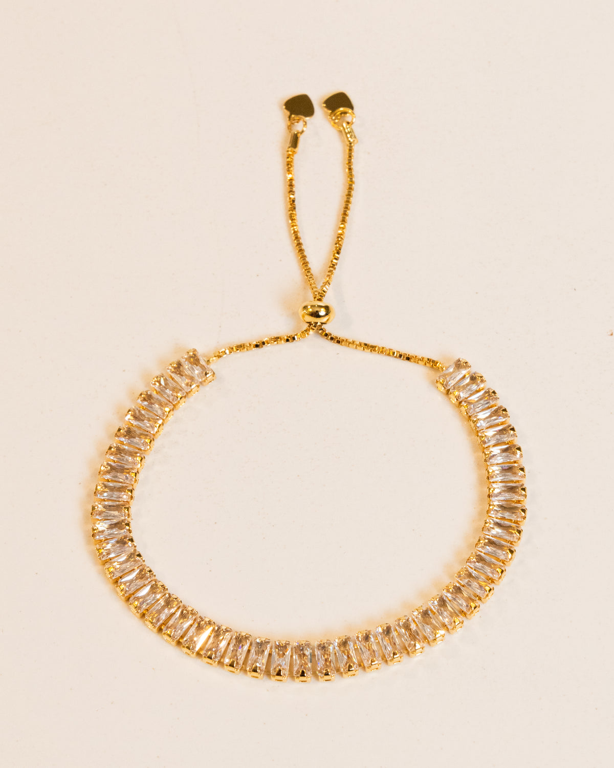 Pulseira Riviera Baguete Zircônia Gravata Banho Ouro 18K